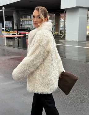 Белая шубка из тиградо - фото 13